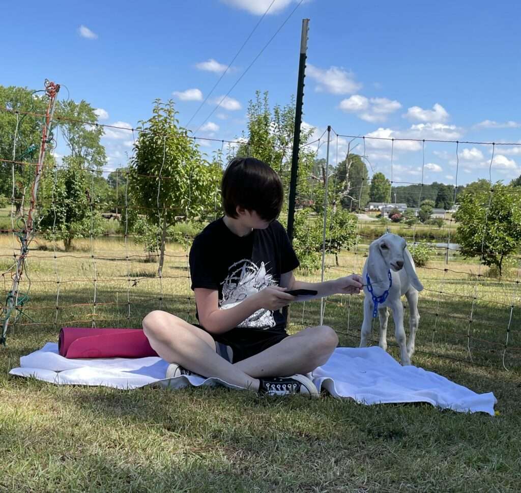 Teen and goat